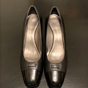 Black leather upper heels with silver accessory.